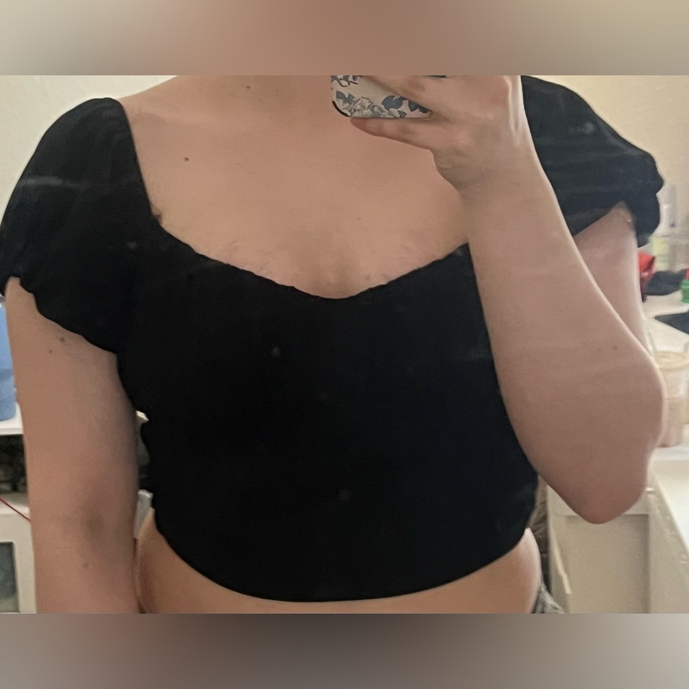 Cute black blouse ties up in the back